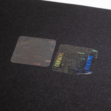 Film d'étanchéité transparent avec étiquettes holographiques cachées 20x20 mm