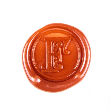 Cachet manuel (sceau) en cire - lettre décorative F